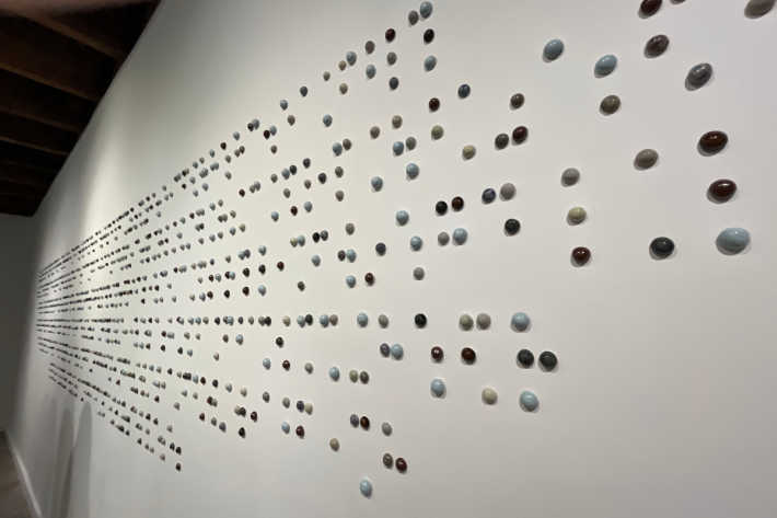 A series of bumps on a wall represent Braille at Positive Space, an art gallery in Tulsa, Oklahoma.